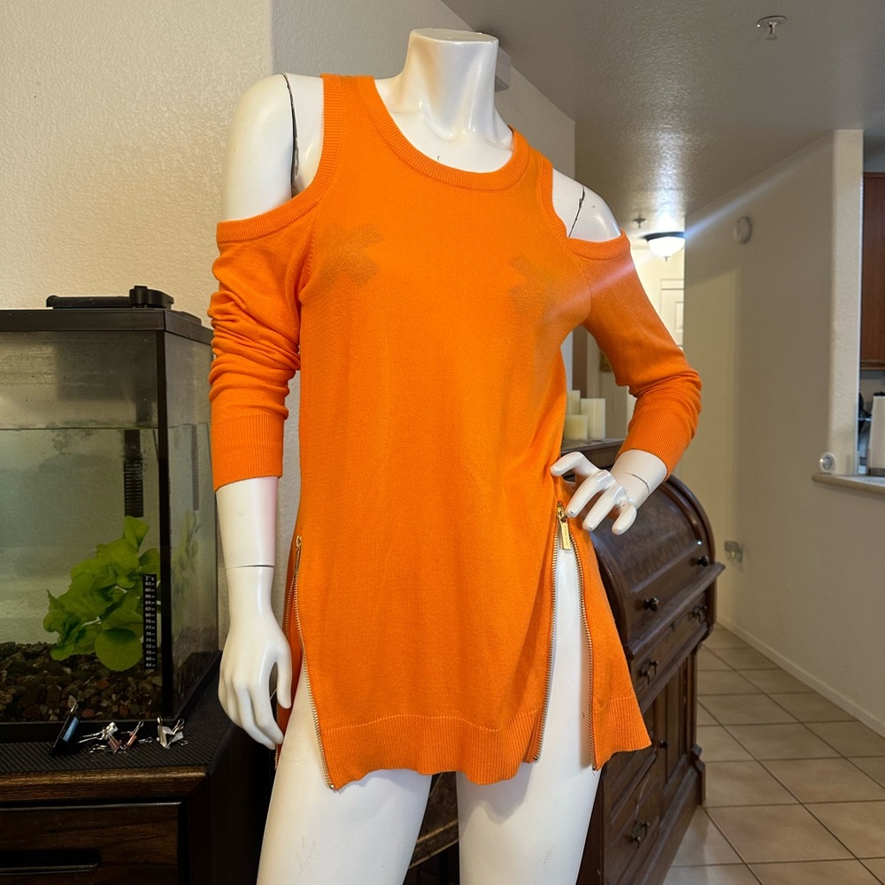 Michael Kors neon orange sweater with cutouts